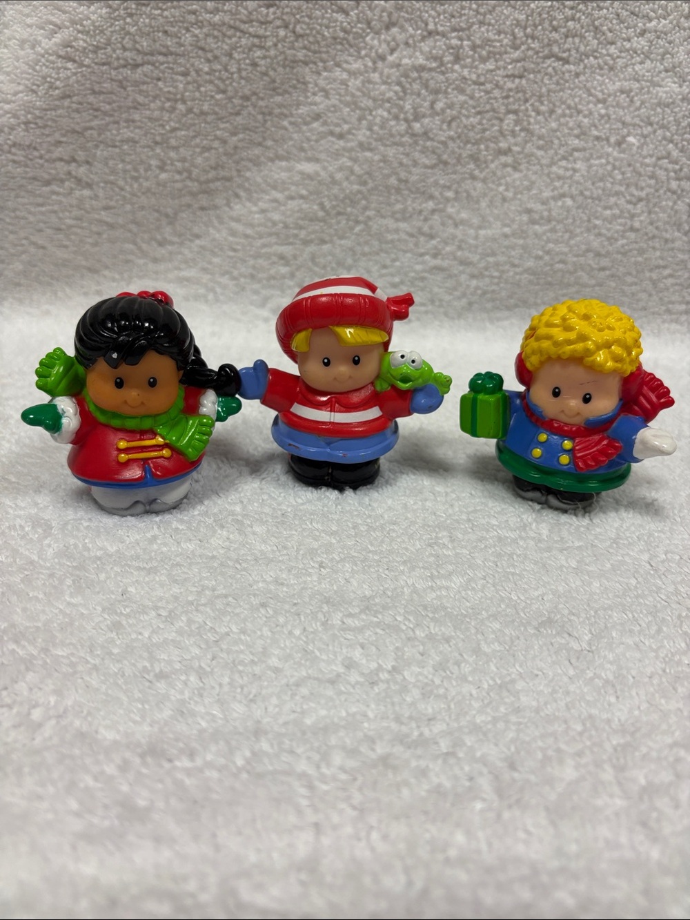 Fisher-Price Holiday winter Hispanic skater boy with gift